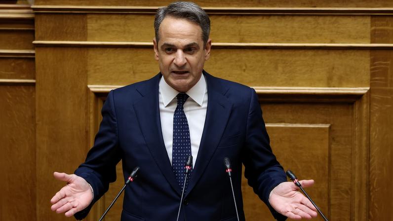 Greek Prime Minister Kyriakos Mitsotakis speaks at the Greek parliament as parliament votes on the 2026 budget, in Athens, Greece, December 16, 2025. REUTERS/Louiza Vradi/File Photo