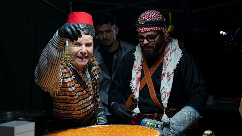 Food vendors at the Ramadan night markets making knafeh in Lakemba, NSW, Australia