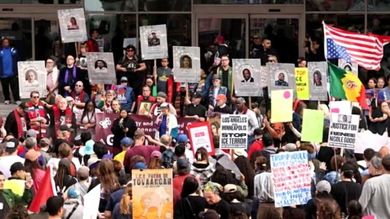 Labor organizers, clergy leaders and immigrant rights groups rally in front of the Federal Building to protest immigration raids nationwide in downtown Los Angeles on 22 January 2026.