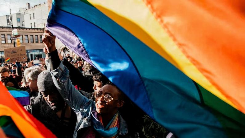People gather at the Stonewall National Monument after authorities removed the Pride flag in New York