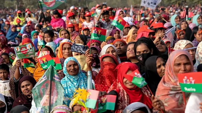 A crowd watches Bangladesh Nationalist Party Chairman Tarique Rahman speak at a rally in Dinajpur, Bangladesh, on Feb. 8.