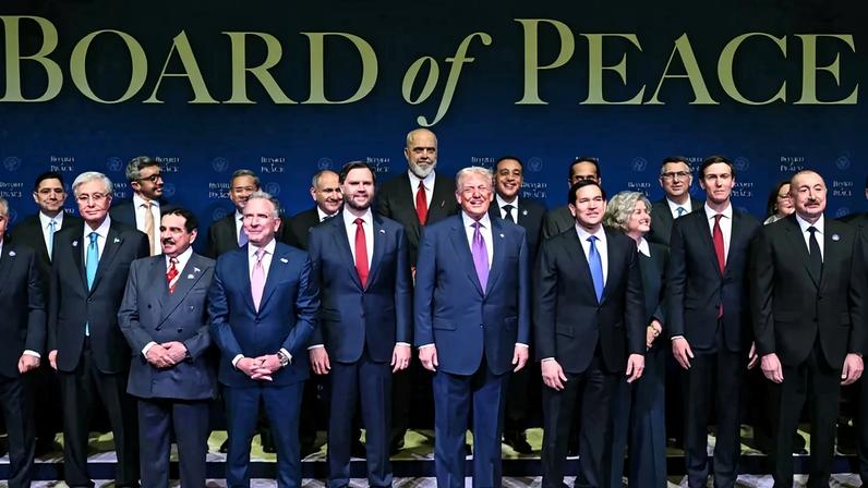 U.S. President Donald Trump joins leaders for a group photo during the inaugural meeting of the Board of Peace.