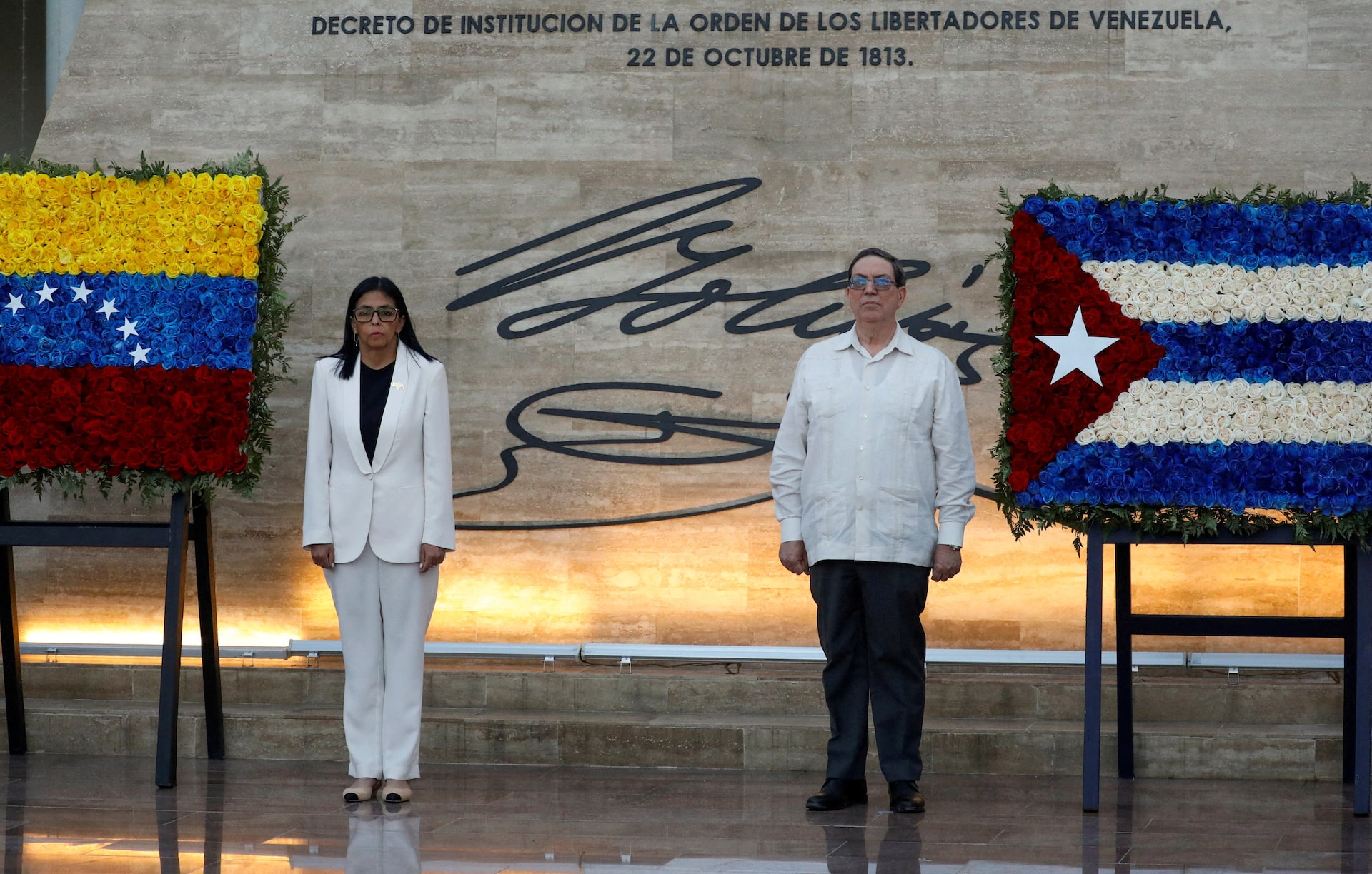 Venezuela's interim president Delcy Rodriguez and Cuban Foreign Minister, Bruno Rodriguez Padilla attend the ceremony "Promotions and Decorations for Heroes and Martyrs", honouring Venezuelan and Cuban military and security personnel who died during a U.S. operation to capture Venezuela's President Nicolas Maduro and his wife Cilia Flores, in Caracas, Venezuela January 8, 2026. REUTERS/Leonardo Fernandez Viloria/File Photo