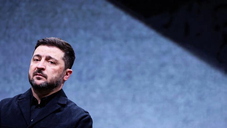 Ukrainian President Volodymyr Zelenskiy looks on during a visit to a facility of German drone maker Quantum Systems, on the sidelines of the annual Munich Security Conference (MSC), near Munich, Germany, February 13, 2026.