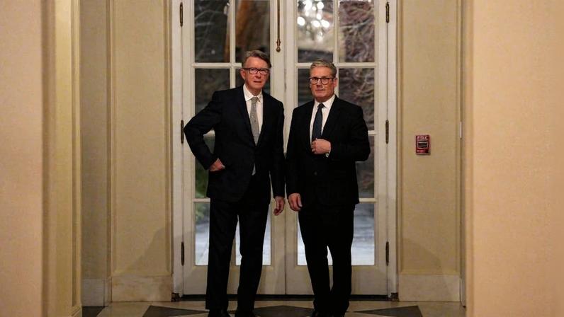 British Prime Minister Keir Starmer talks with Britain's ambassador to the United States Peter Mandelson during a welcome reception at the ambassador's residence on February 26, 2025 in Washington.