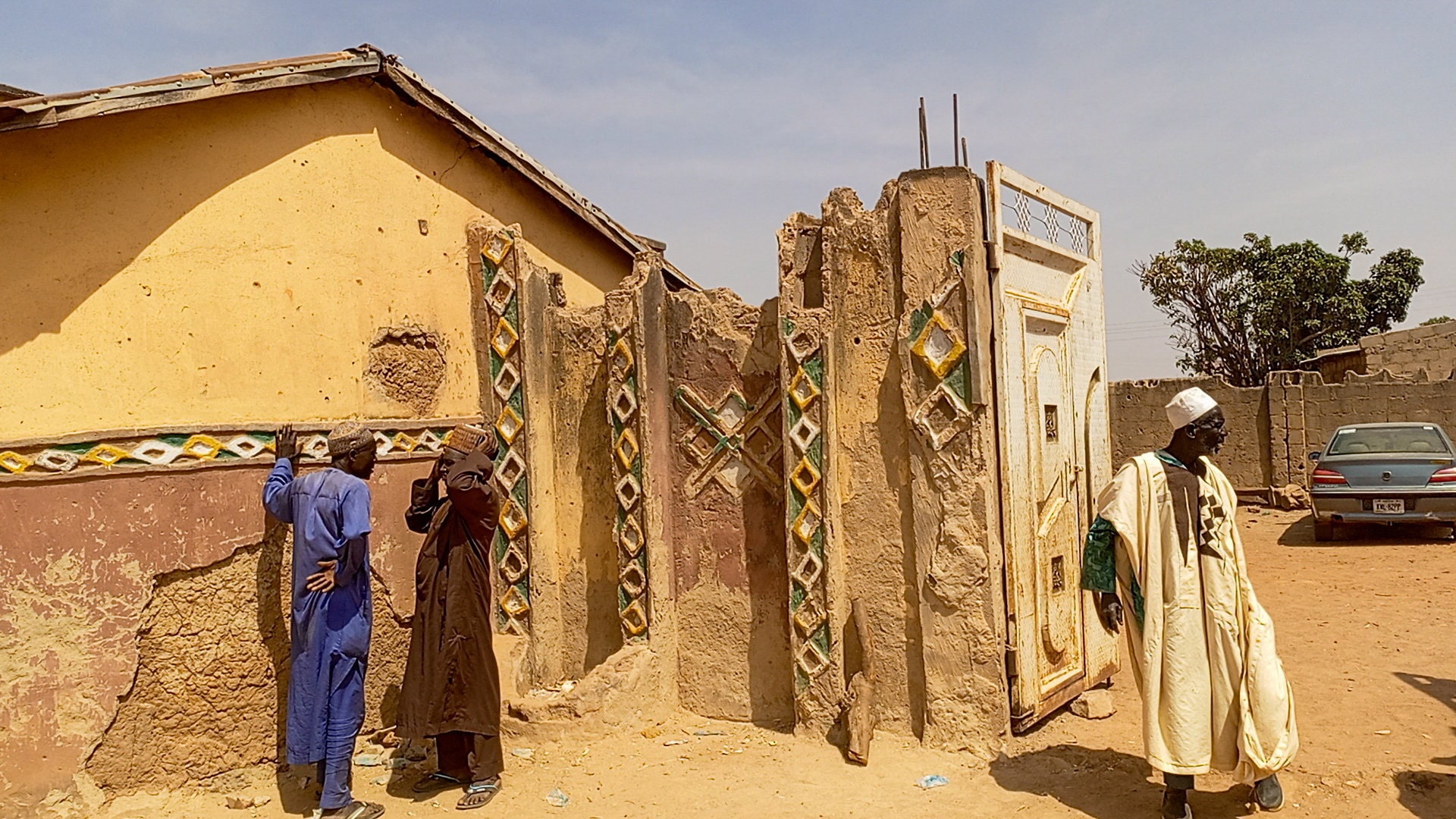 Members of the local community gather outside the residence of the Emir of Tafoki to offer condolences following a deadly raid carried out by armed gunmen from a local gang, in Doma, Katsina State, Nigeria, February 4, 2026. Picture taken with a phone.