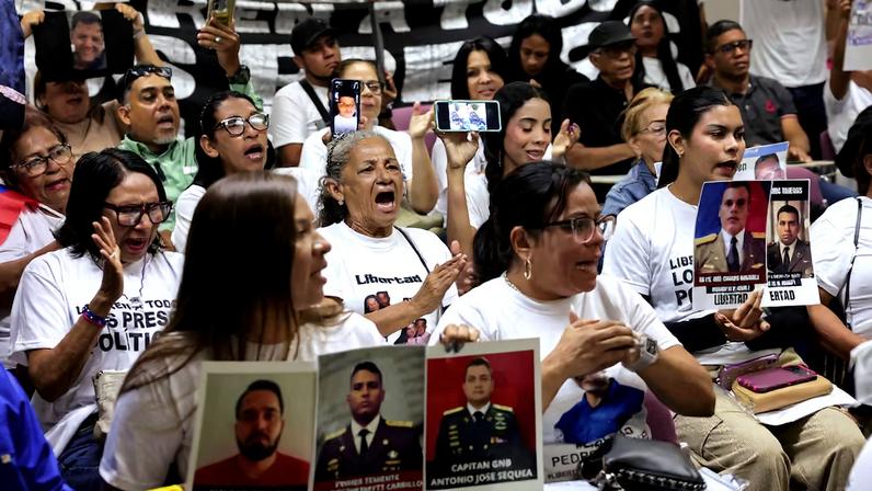 Relatives of detainees and activist speak to the media in Caracas