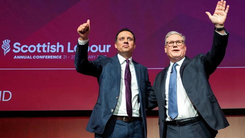 British Prime Minister Keir Starmer with Scottish Labour party leader Anas Sarwar react on stage after Starmer's keynote speech during the Scottish Labour Party annual conference at the SEC...