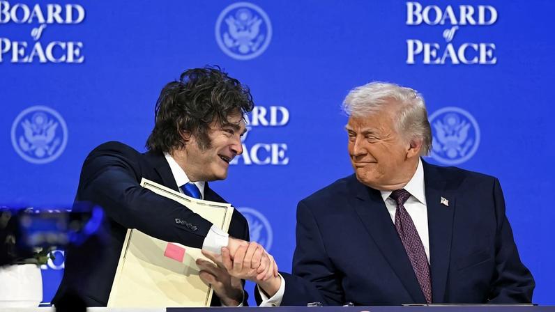 Argentine President Javier Milei shakes hands with U.S. President Donald Trump at a meeting of Trump’s “Board of Peace” during the World Economic Forum annual meeting in Davos, Switzerland.