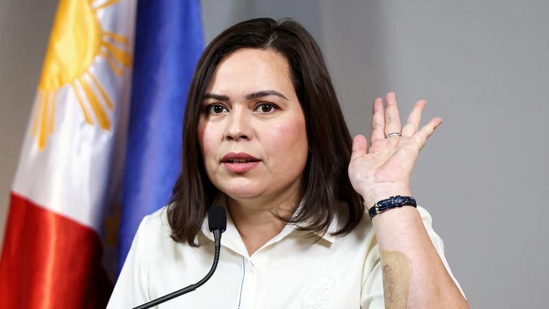 Philippine Vice President Sara Duterte gestures as she delivers a statement following her impeachment by the lower house of the Congress, in her office at Mandaluyong City, Metro Manila, Philippines, February 7, 2025.