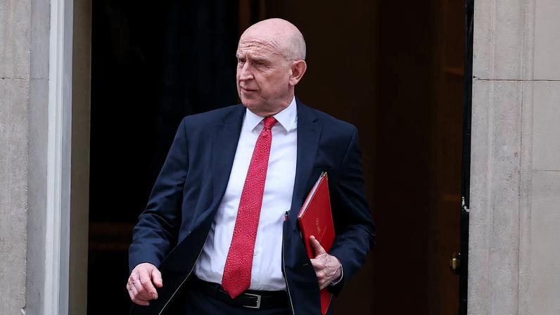 British Defense Minister John Healey walks outside of 10 Downing Street, on the day of a cabinet meeting, following calls for Prime Minister Keir Starmer to step down after criticism of his appointment of Peter Mandelson as U.S. ambassador, after the release of new U.S. Justice Department files linked to the late financier and convicted sex offender Jeffrey Epstein, in London, Britain, February 10, 2026. REUTERS/Toby Melville/File Photo