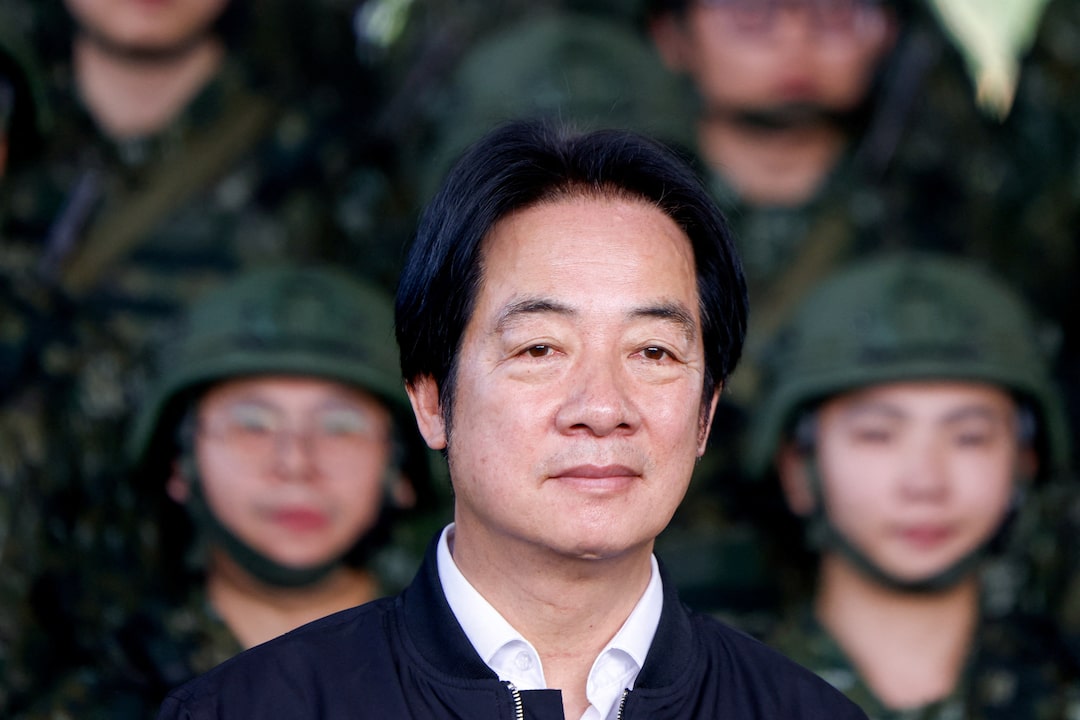 Taiwan President Lai Ching-te inspects reservists during a training session at Loung Te Industrial Parks Service Center in Yilan