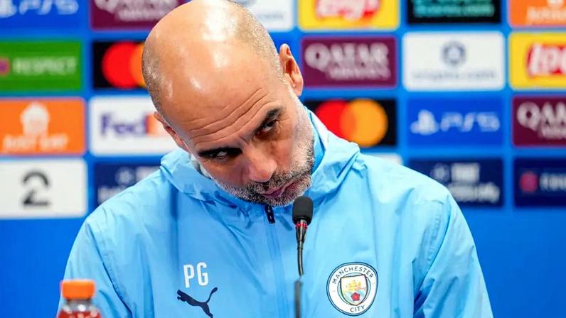 Pep Guardiola em coletiva do Manchester City (Foto: Fredrik Varfjell/AFP)