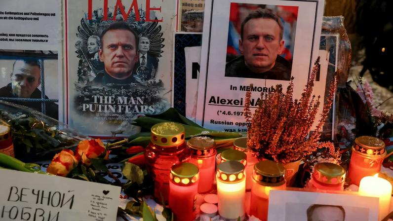Supporters of late Kremlin critic Alexei Navalny protest outside the Russian Embassy in Berlin