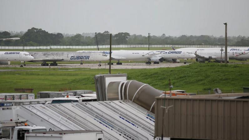 Cuba' state-owned airline Cubana airplanes are seen parked at the Havana's International Airport in Havana, Cuba, June 14, 2018. REUTERS/Alexandre Meneghini/File Photo
