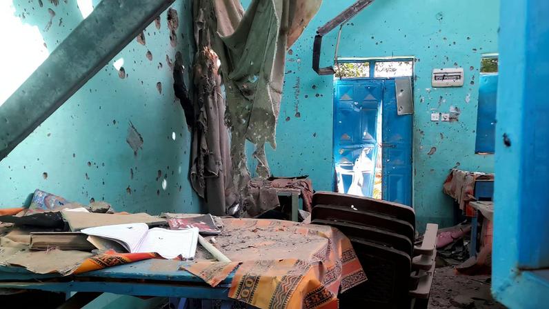 A desk bearing signs of shelling in a school where displaced people are sheltering, in El Fasher, Sudan, October 7, 2025.
