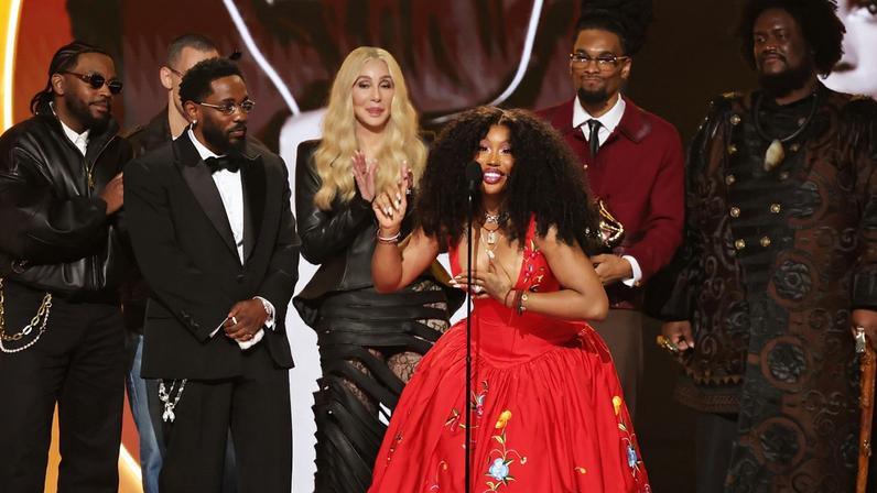LOS ANGELES, CALIFORNIA - FEBRUARY 01: Cher (3rd L) presents the Record Of The Year award for "luther" to (from L) Sounwave, Jack Antonoff, Kendrick Lamar, SZA, Scott Bridgeway, and Kamasi Washington onstage during the 68th GRAMMY Awards at Crypto.com Arena on February 01, 2026 in Los Angeles, California. (Photo by Kevin Winter/Getty Images for The Recording Academy)