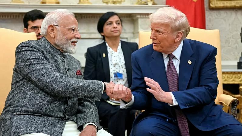 Indian Prime Minister Narendra Modi shakes hands with U.S. President Donald Trump at the White House.