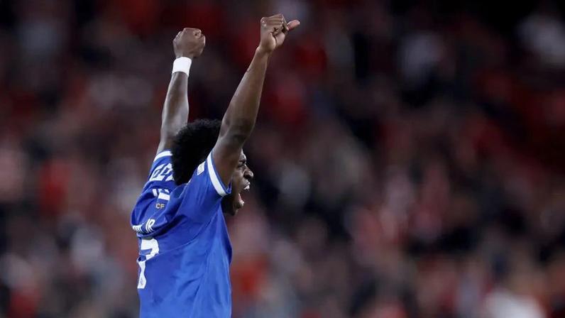 Vini Jr comemorando gol marcado pelo Real Madrid sobre o Benfica, na Champions League (Foto: Filipe Amorim/AFP)