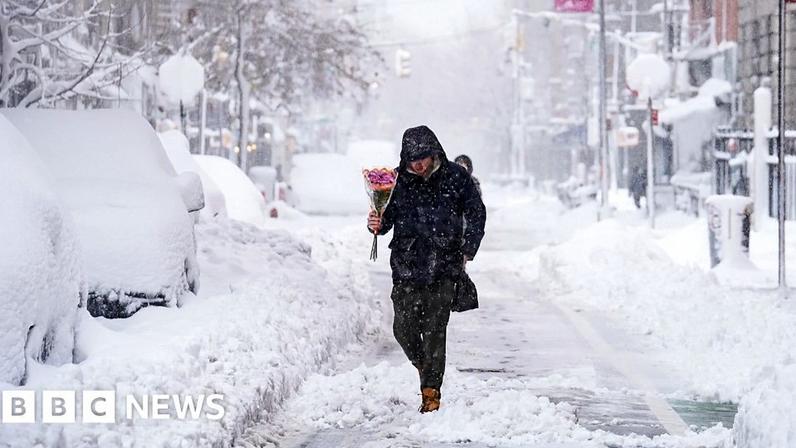 Watch: US TV reporters battle snowy conditions as a major storm hits east coast