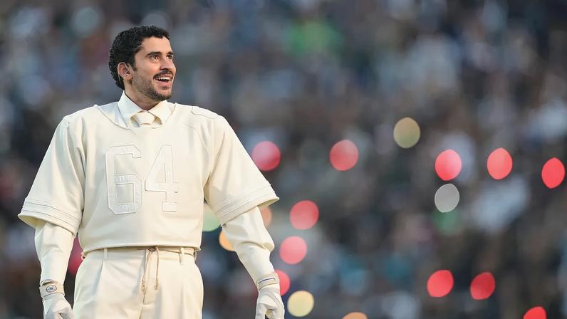 Bad Bunny performed during the Super Bowl 2026 halftime show wearing a white Zara football jersey and suit.