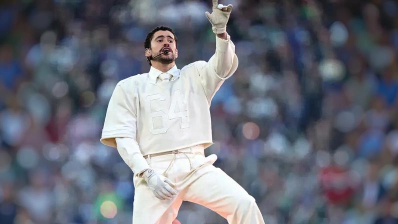 Bad Bunny wore an all-white Zara look at the Super Bowl 2026 with the number 64 on his chest.
