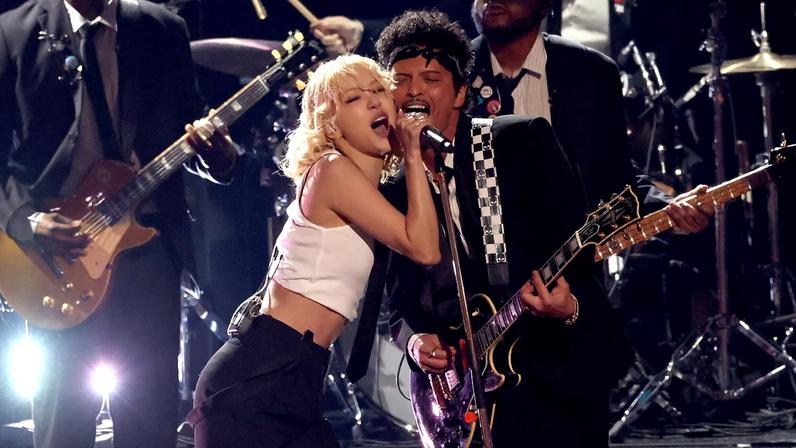 LOS ANGELES, CALIFORNIA - FEBRUARY 01: (FOR EDITORIAL USE ONLY) (L-R) Rosé and Bruno Mars perform onstage during the 68th GRAMMY Awards at Crypto.com Arena on February 01, 2026 in Los Angeles, California. (Photo by Frazer Harrison/Getty Images)