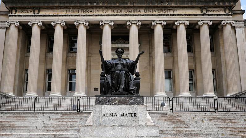 Students are seen on the campus of Columbia University on April 14, 2025, in New York City. An immigration judge ruled on April 11 that Mahmoud Khalil, a pro-Palestinian student protester from Columbia University and a US permanent resident detained by the Trump administration, can be deported, his lawyer said. (Photo by CHARLY TRIBALLEAU / AFP) (Photo by CHARLY TRIBALLEAU/AFP via Getty Images)