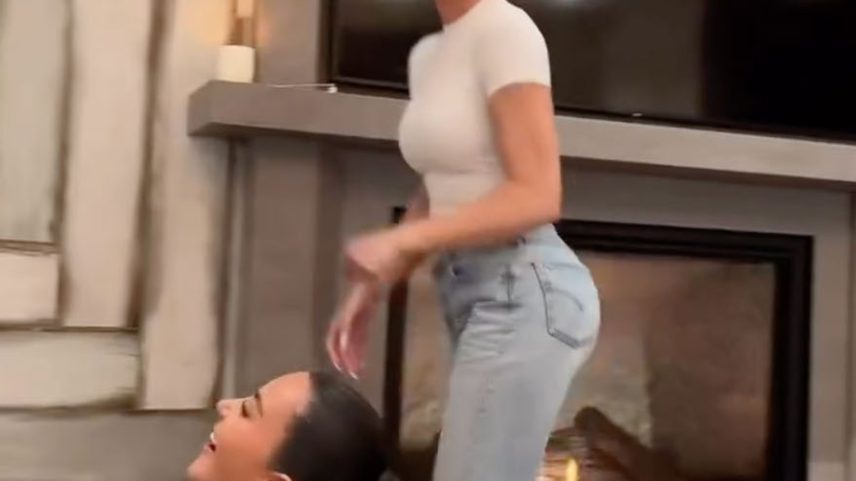 Lewis Hamilton spent time with rumored girlfriend Kim Kardashian and her sisters.