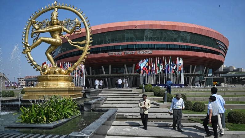 Visitors arrive to attend the AI Impact Summit at the Bharat Mandapam in New Delhi, India, on Feb. 17.