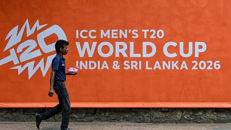 A man walks past a billboard advertising the 2026 ICC Men's T20 World Cup, at the Sinhalese Sports Club (SSC) cricket stadium in Colombo on February 5.