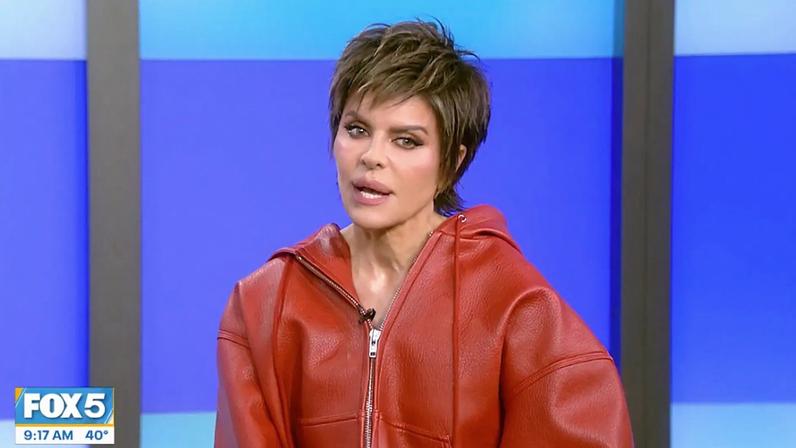 Lisa Rinna on Fox wearing a red jacket.