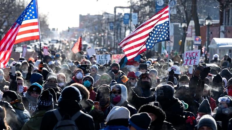Protesters gather near where a man was shot dead by federal immigration agents in Minneapolis on Jan. 24.