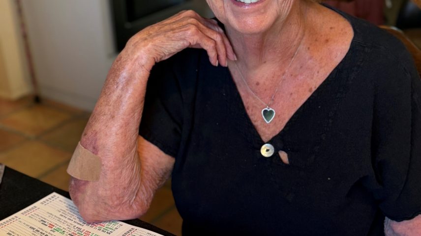 Nancy Guthrie smiling while playing Mahjong.