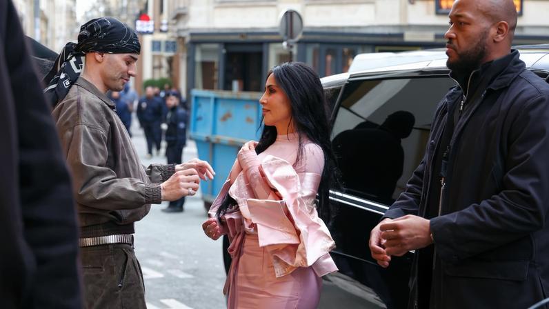 Kim Kardashian, seen here solo on Monday, and Lewis Hamilton were photographed in Paris.