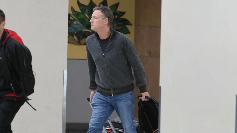 Michael Feldman, seen here Tuesday, landed in Arizona to be with his wife, Savannah Guthrie, as the search for his mother-in-law, Nancy Guthrie, continues.