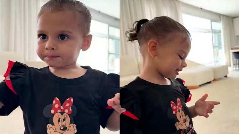 Amanda Kimberlly mostra Helena filha de Neymar falando enquanto alimenta peixes