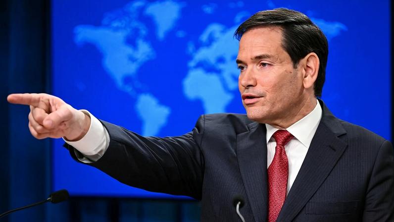 U.S. Secretary of State Marco Rubio gestures as he speaks during an end-of-year press conference in the State Department Press Briefing Room in Washington, DC on December 19, 2025.