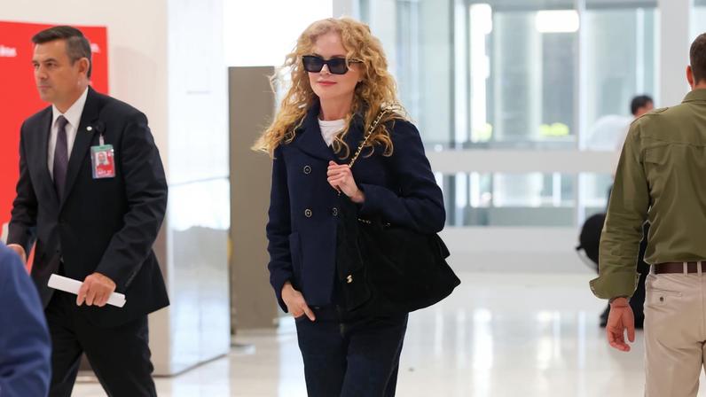 Nicole Kidman headed to the Sydney airport on Wednesday, natural curls on full display.