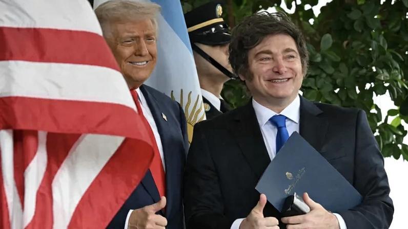 U.S. President Donald Trump and Argentine President Javier Milei pose at the White House in Washington on Oct. 14, 2025.