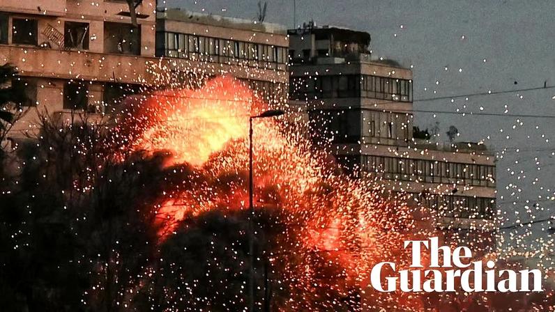 Footage shows a multistorey building collapsing in the Bashoura neighbourhood of Beirut after being hit by missiles on Wednesday morning