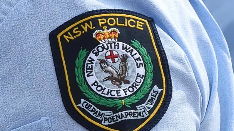 New South Wales police force badge on officer's uniform