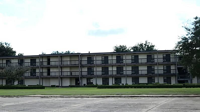 The barracks building earmarked for conversation as a new facility to hold migrant families and unaccompanied minors next to Alexandria international airport.