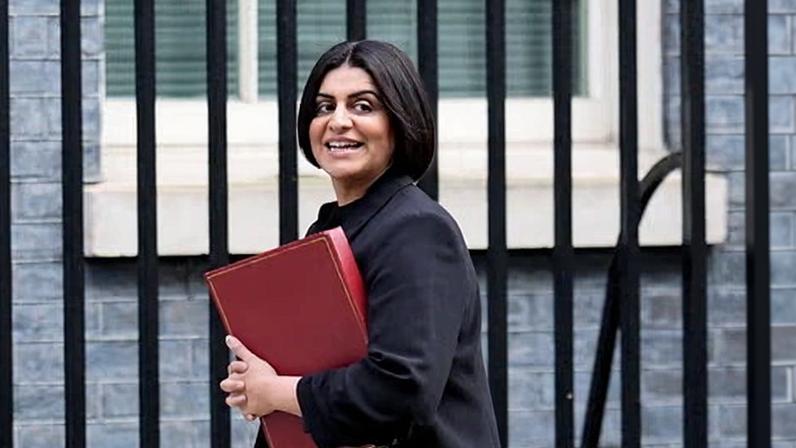 The home secretary arriving at Downing Street.