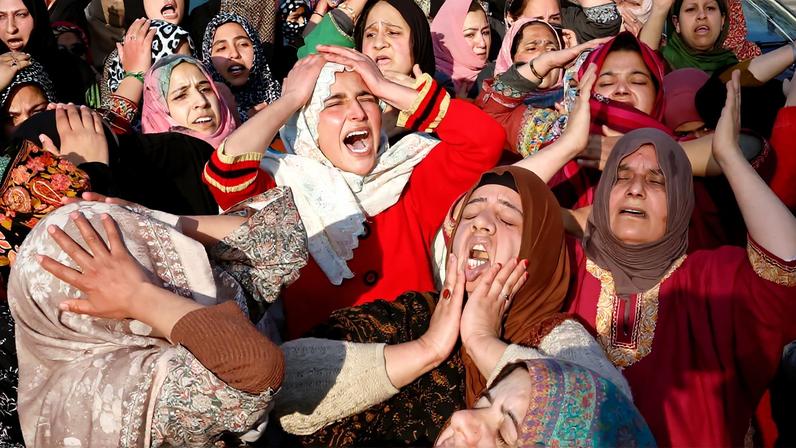 Shi'ite Muslim women react as they gather for a protest march, after Iran's Supreme Leader Ayatollah Ali Khamenei was killed in Israeli and U.S. strikes on Saturday, in Srinagar, Indian Kashmir March 1, 2026. REUTERS/Sharafat Ali