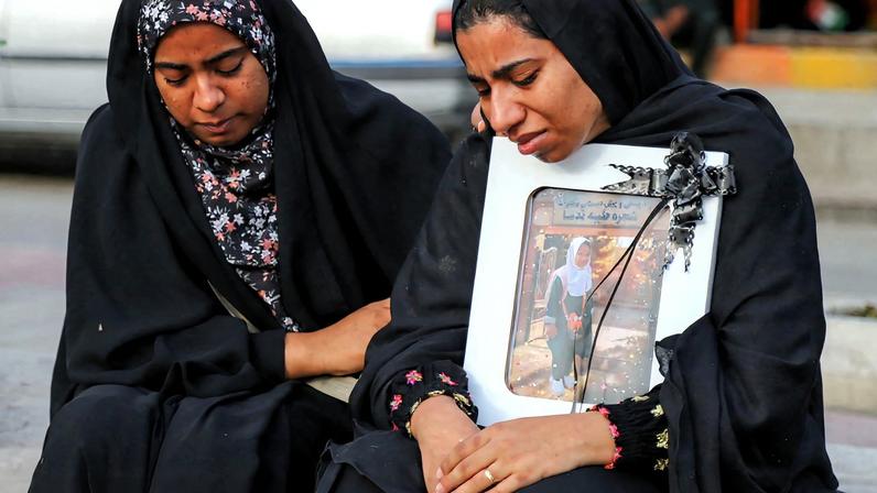 People mourn on the day of the funeral of the victims following a reported strike on a school in Minab, Iran, March 3, 2026. Amirhossein Khorgooei/ISNA/WANA (West Asia News Agency) via REUTERS ATTENTION EDITORS - THIS PICTURE WAS PROVIDED BY A THIRD PARTY. TPX IMAGES OF THE DAY REFILE – REMOVING ATTRIBUTION TO STRIKE