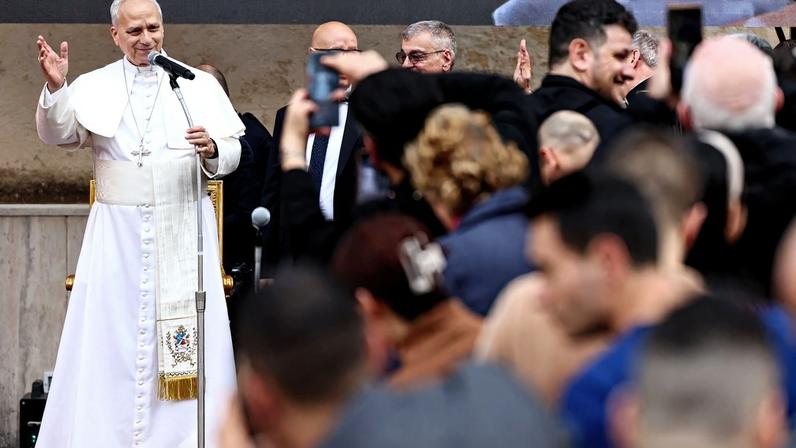 Pope Leo XIV salutes faithful during a visit to the parish complex of Sacro Cuore di Gesu in Ponte Mammolo, where he stressed that conflicts cannot be resolved through war and called for continuous dialogue for peace, on the outskirts of Rome, Italy, March 15, 2026 REUTERS/Matteo Minnella