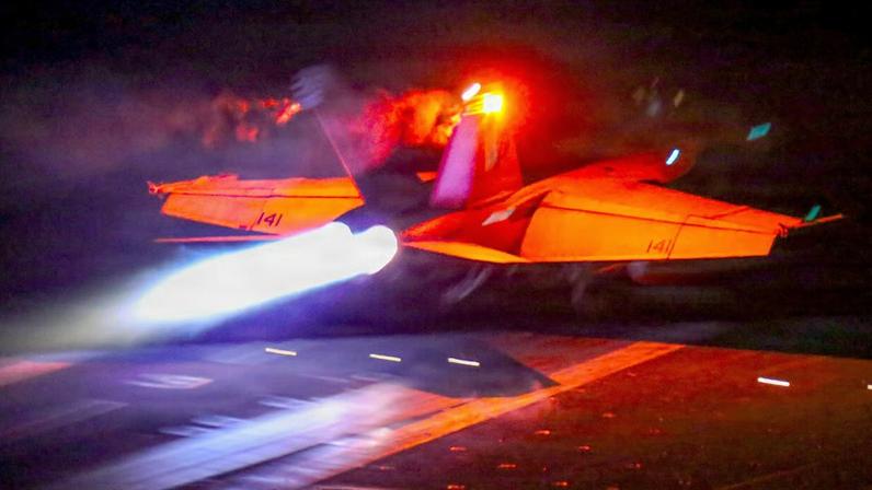 An F/A-18F Super Hornet, attached to Strike Fighter Squadron (VFA) 41, launches from the flight deck of Nimitz-class aircraft carrier USS Abraham Lincoln