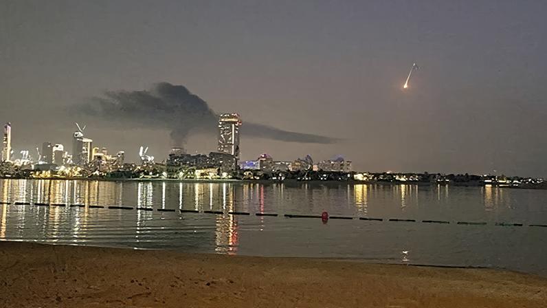 Several injured as luxury Dubai hotel hit amid Iranian missile strikes – video