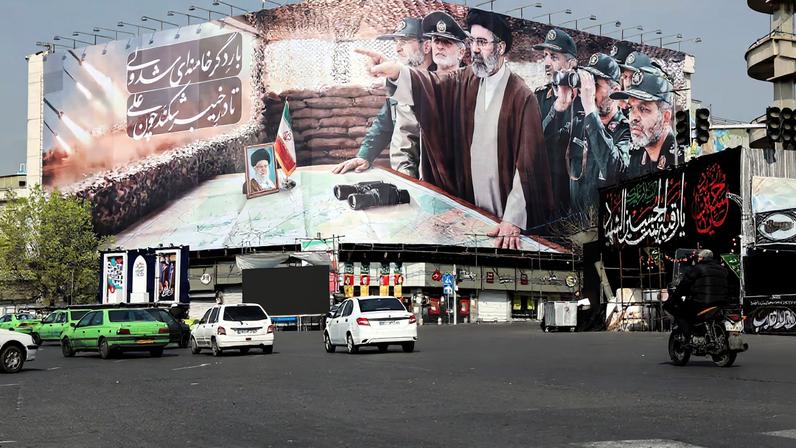 Cars pass a banner featuring Iran's new Supreme Leader Mojtaba Khamenei, amid the U.S.-Israeli conflict with Iran, in Tehran, Iran, March 14, 2026. Majid Asgaripour/WANA (West Asia News Agency) via REUTERS